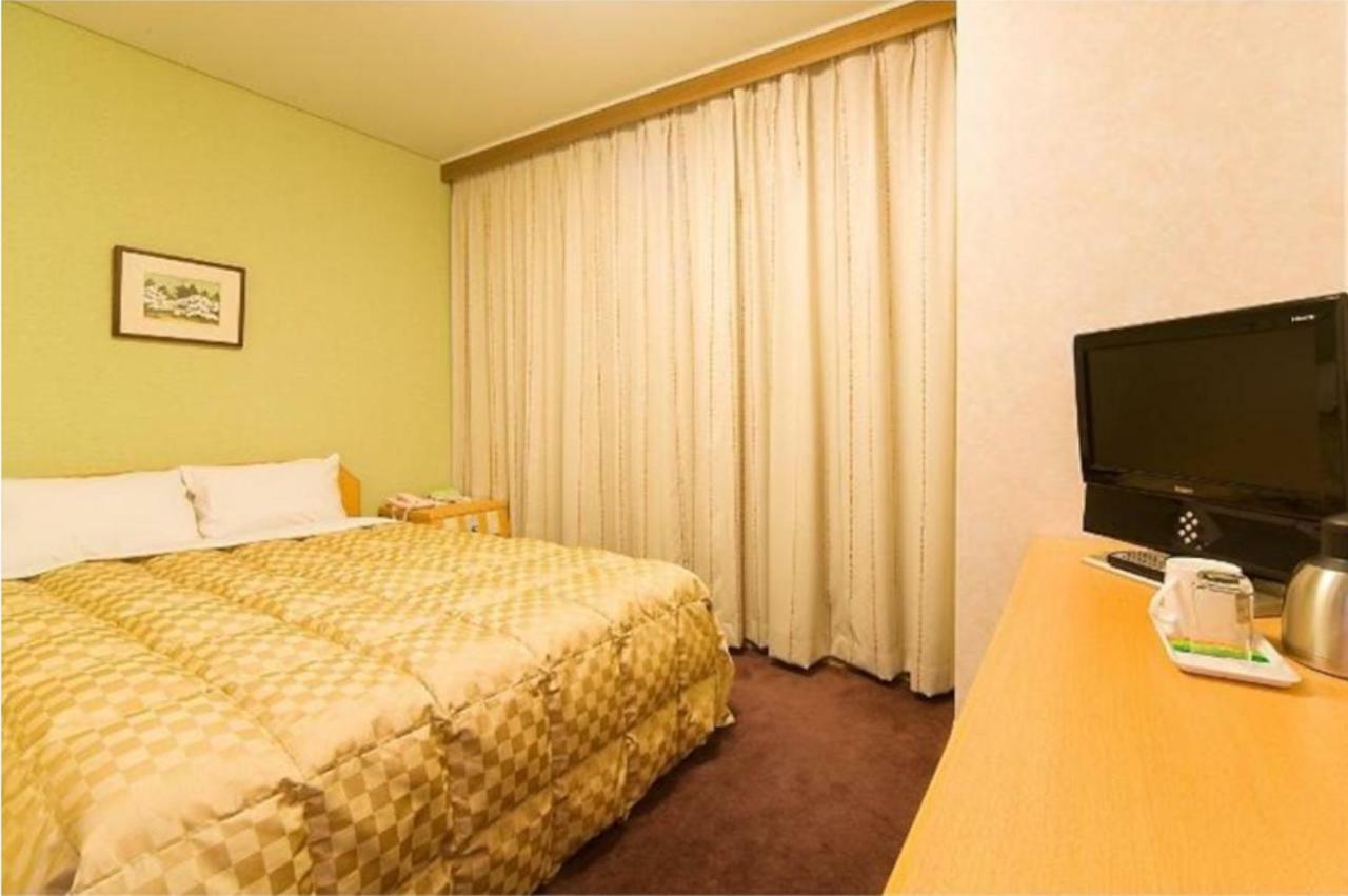 Highness Hotel Куруме Экстерьер фото